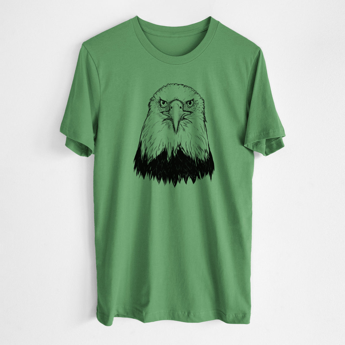 Leaf green lightweight cotton t-shirt laid flat, printed with a detailed black ink portrait of a bald eagle facing forward.