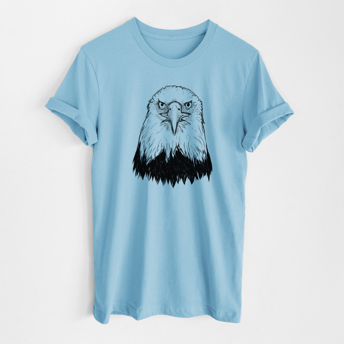 Ocean blue lightweight cotton t-shirt laid flat, printed with a detailed black ink portrait of a bald eagle facing forward.