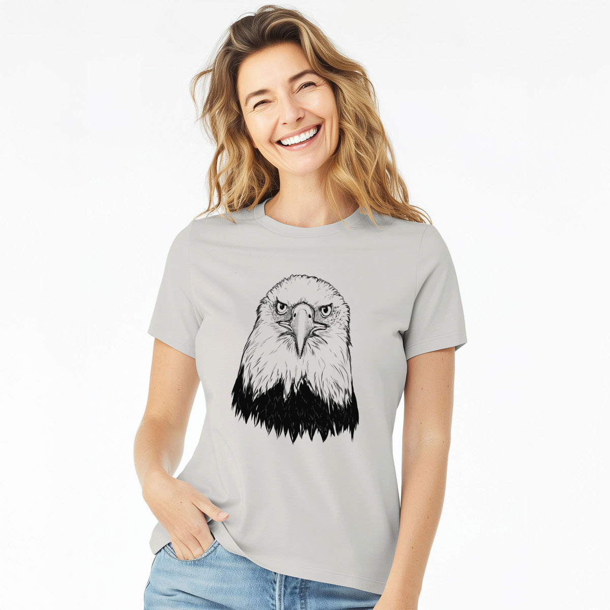 Woman wearing a lunar grey women's relaxed fit cotton t-shirt printed with a detailed black ink portrait of a bald eagle facing forward.
