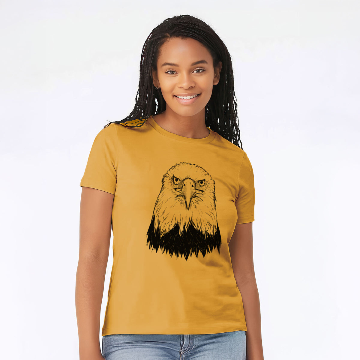 Woman wearing a mustard yellow women's relaxed fit cotton t-shirt printed with a detailed black ink portrait of a bald eagle facing forward.