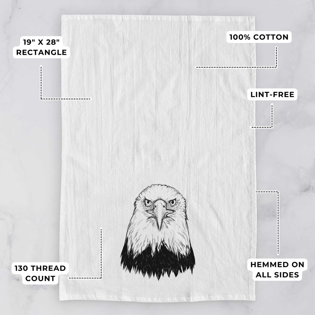 White tea towel printed with a detailed black ink portrait of a bald eagle facing forward, with feature labels: 19 by 28 inch rectangle, 100% cotton, lint-free, 130 thread count, hemmed on all sides.