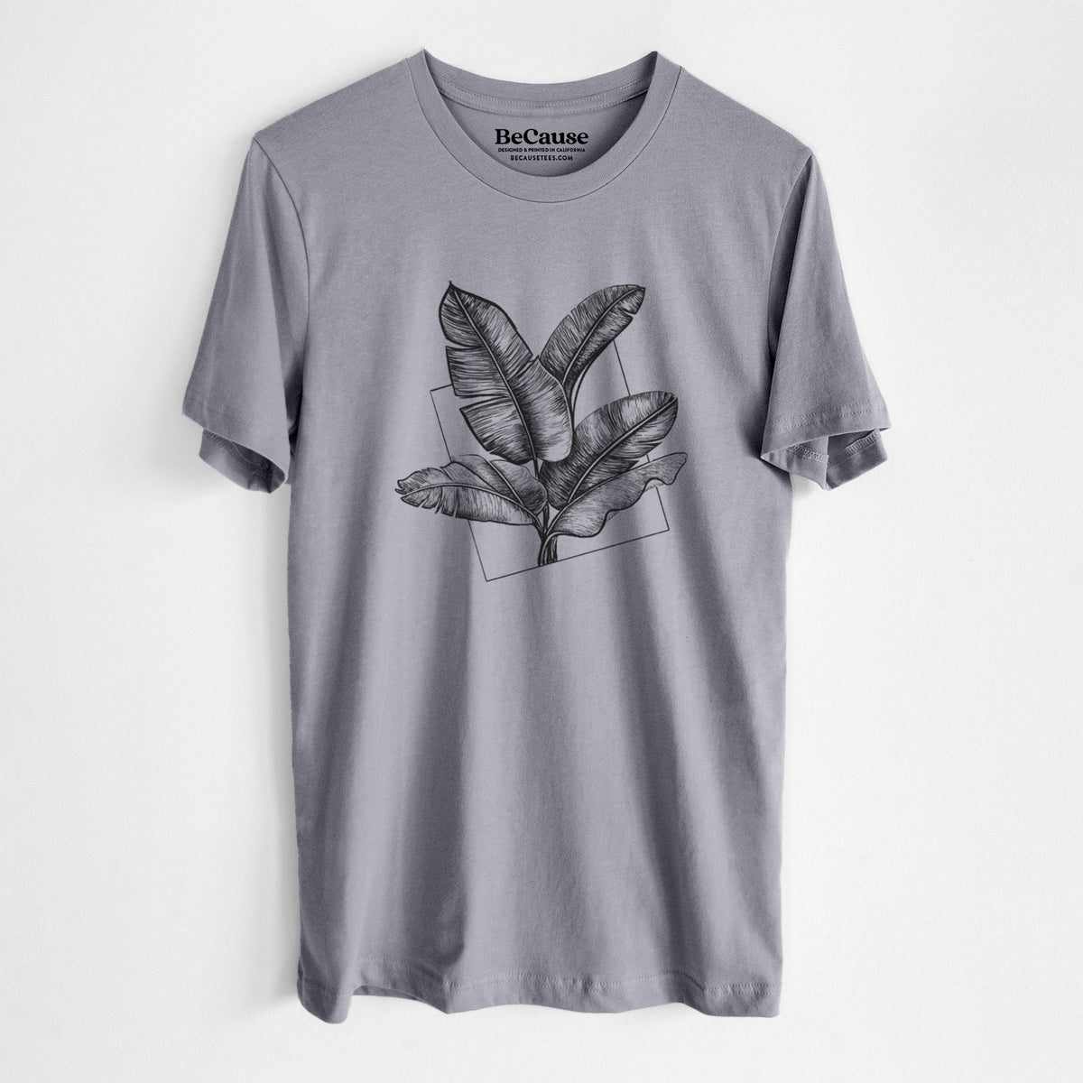 Storm grey lightweight cotton t-shirt laid flat, printed with a black ink illustration of banana leaves in front of a square outline.