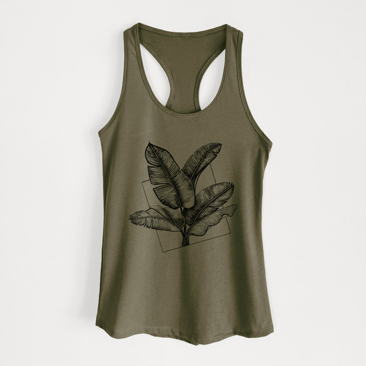 Military green women's racerback tank top laid flat, printed with a black ink illustration of banana leaves in front of a square outline.