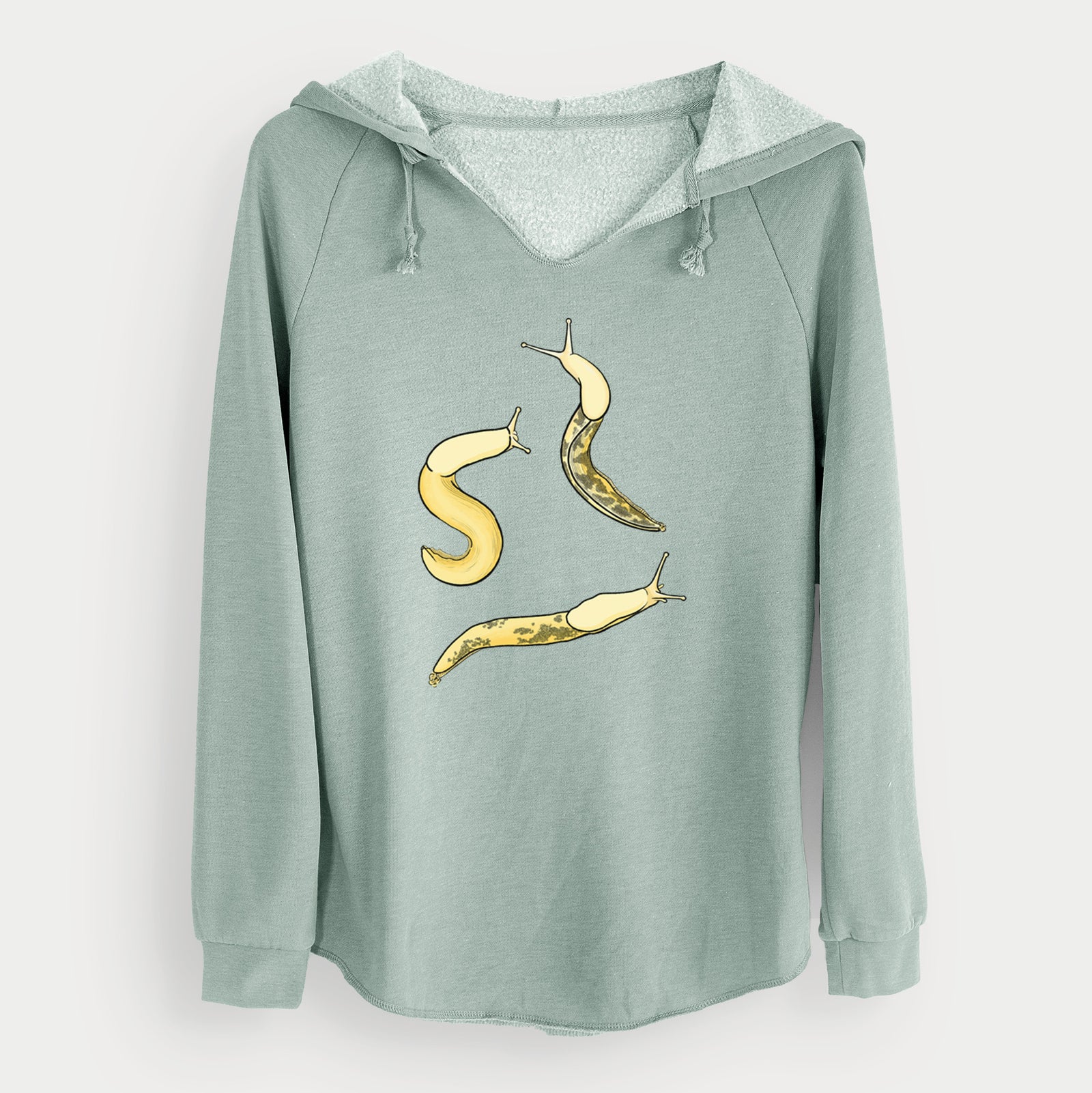 Sage green women's Cali Wave hooded sweatshirt laid flat, printed with a full-color illustration of three yellow banana slugs.