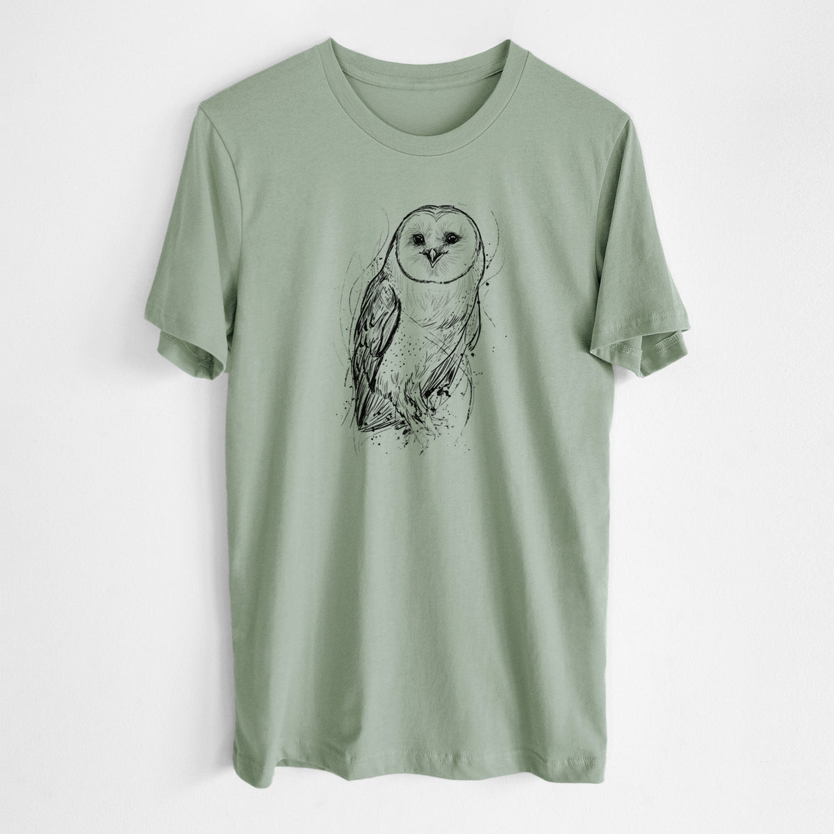 Sage green lightweight cotton t-shirt laid flat, printed with a detailed black ink illustration of a barn owl standing and facing forward.