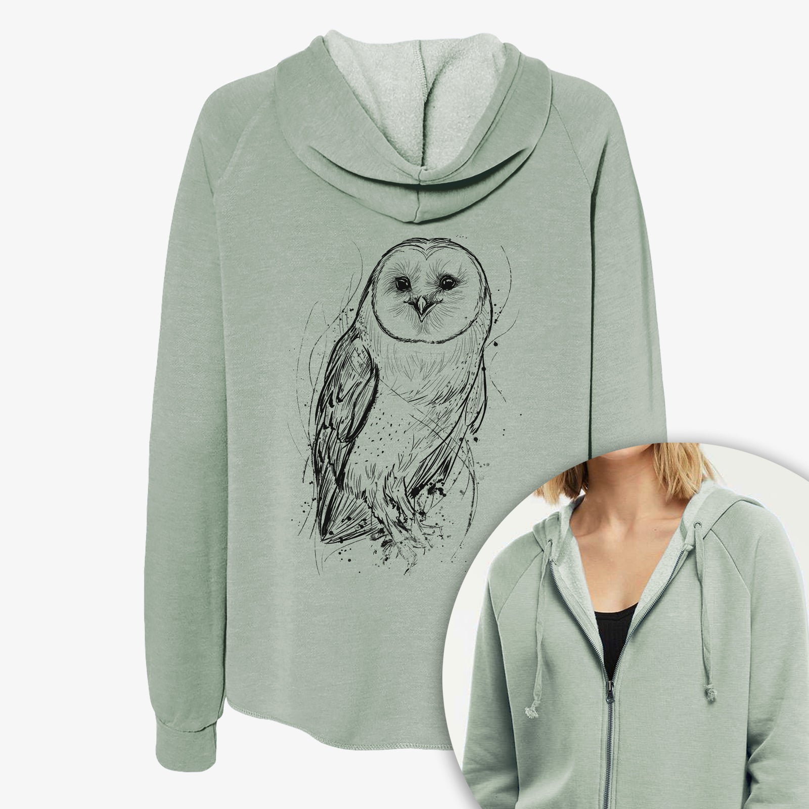 Women's Cali Wave zip-up sweatshirt printed with a detailed black ink illustration of a barn owl standing and facing forward, with a close-up of the zipper.