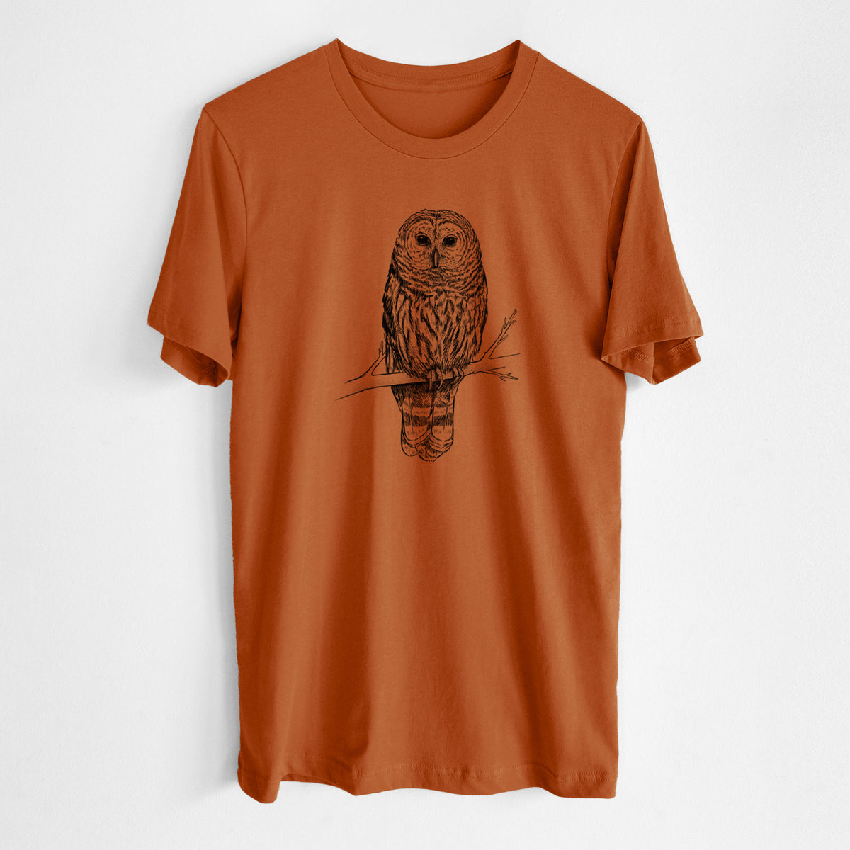 Autumn lightweight cotton t-shirt laid flat, printed with a detailed black ink illustration of a barred owl perched on a branch.