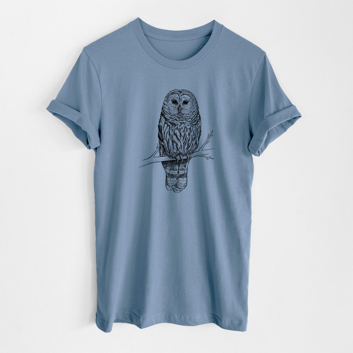 Steel blue lightweight cotton t-shirt laid flat, printed with a detailed black ink illustration of a barred owl perched on a branch.
