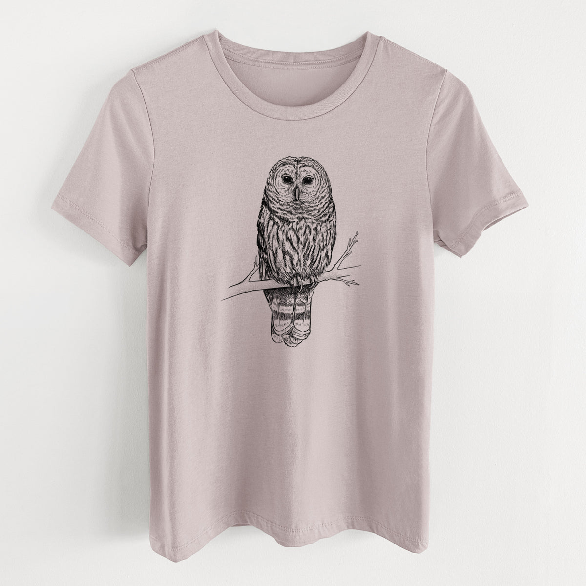 Pink gravel women's relaxed fit cotton t-shirt laid flat, printed with a detailed black ink illustration of a barred owl perched on a branch.