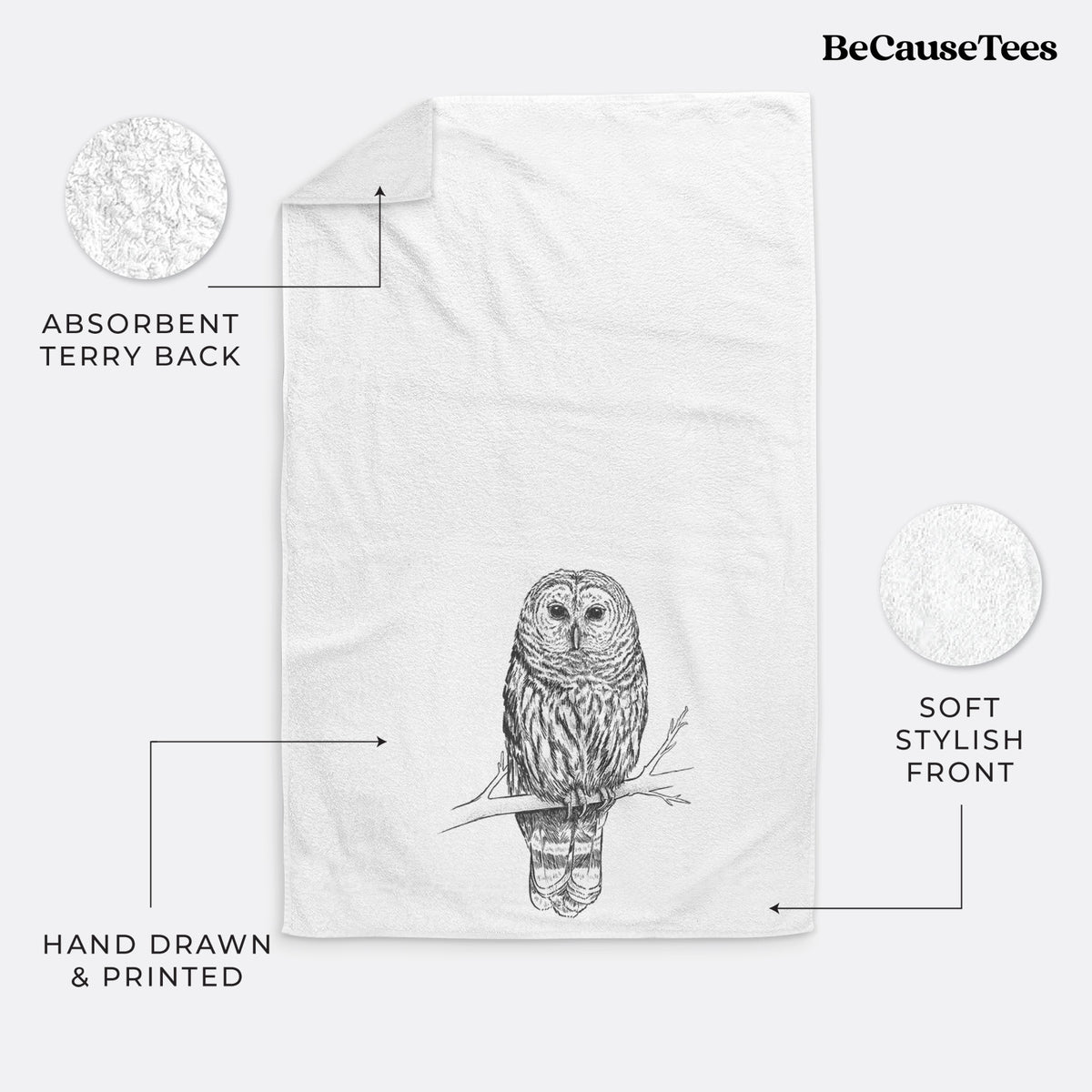 White hand towel printed with a detailed black ink illustration of a barred owl perched on a branch.