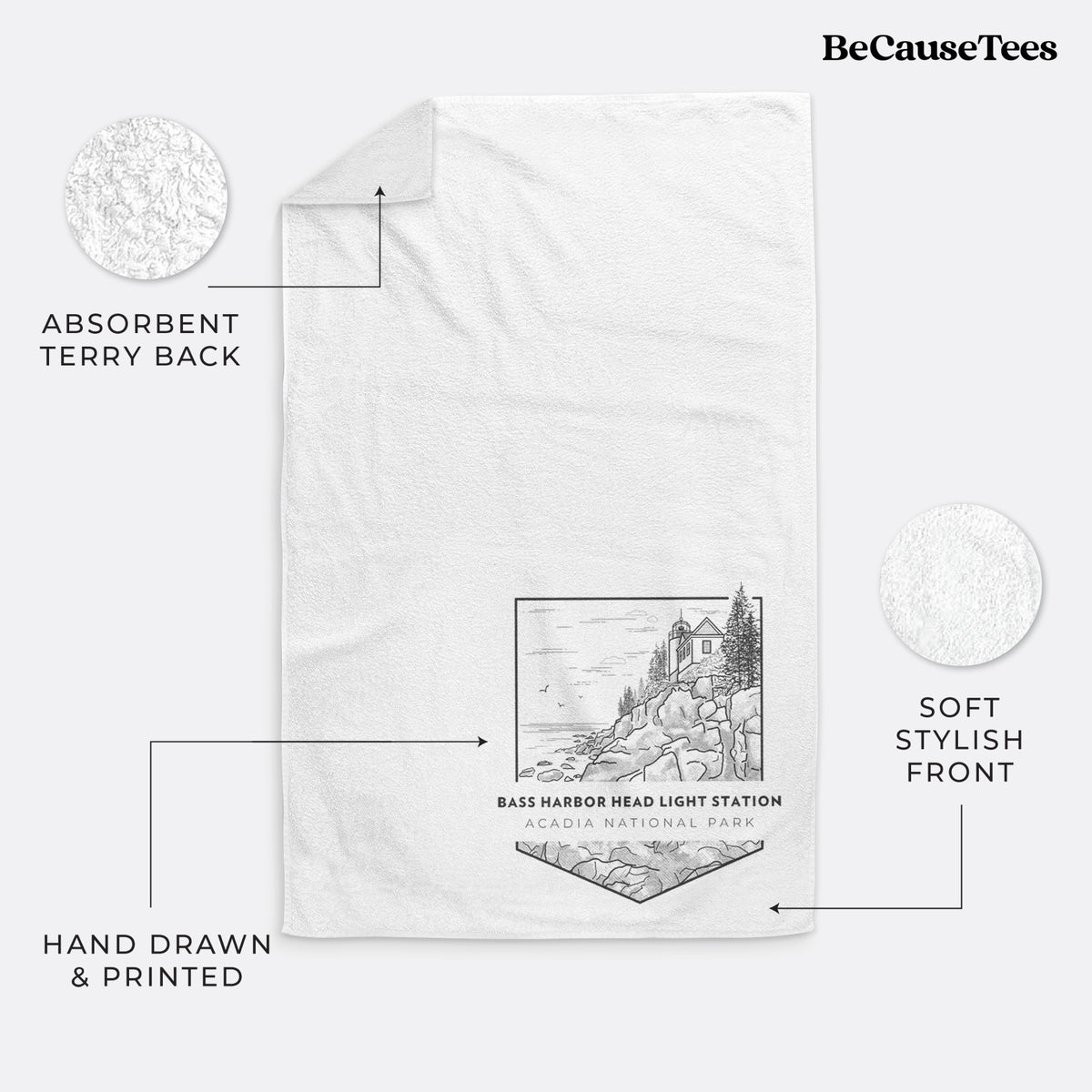 White hand towel printed with a black line art badge of Bass Harbor Head Light Station on a rocky cliff, with the words Acadia National Park.