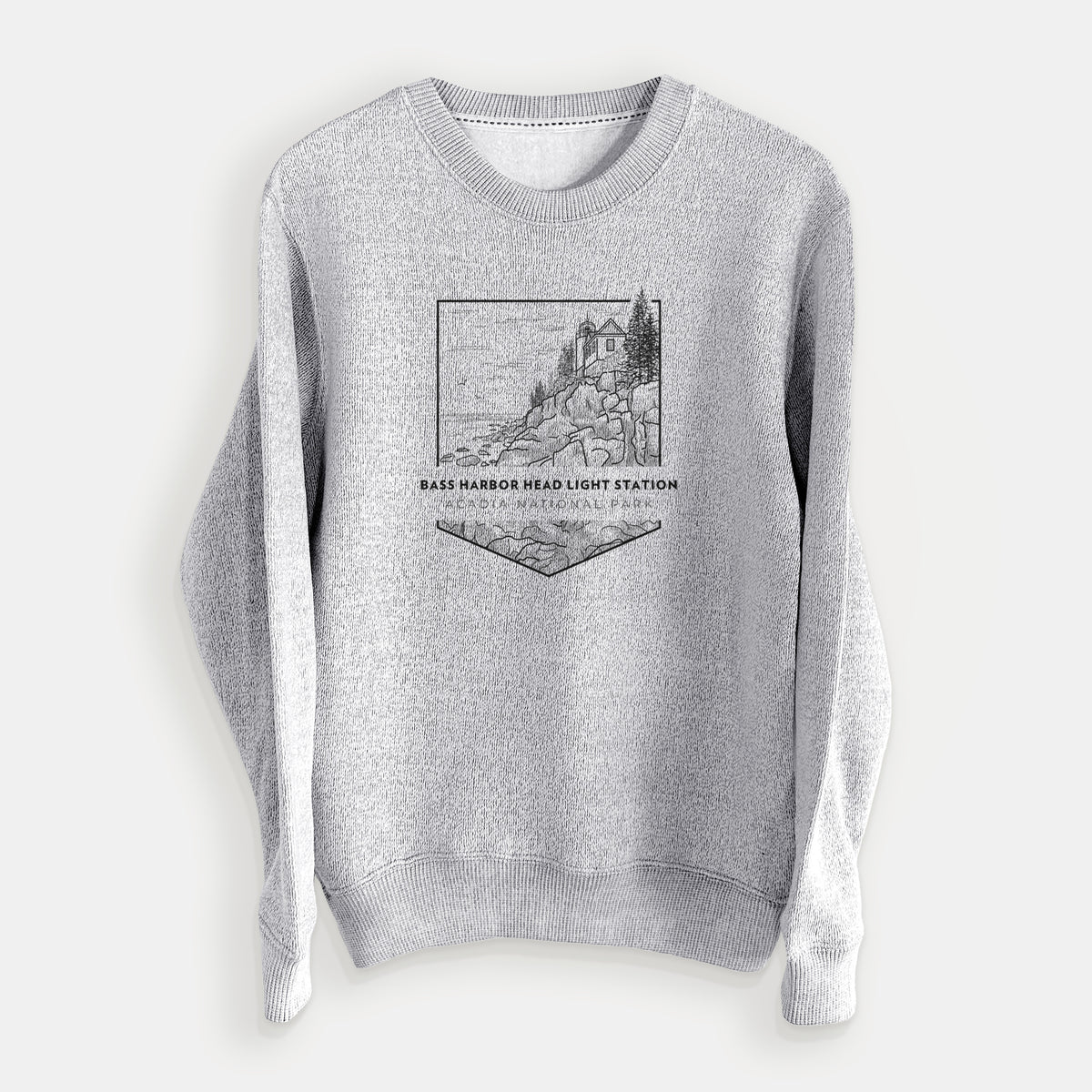 Salt and pepper knit sweatshirt laid flat, printed with a black line art badge of Bass Harbor Head Light Station on a rocky cliff, with the words Acadia National Park.