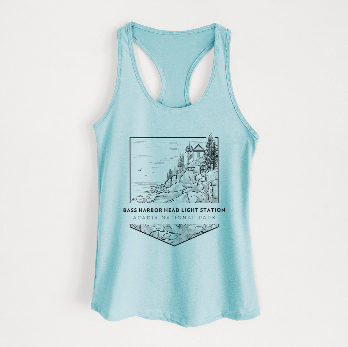 Cancun blue women's racerback tank top laid flat, printed with a black line art badge of Bass Harbor Head Light Station on a rocky cliff, with the words Acadia National Park.