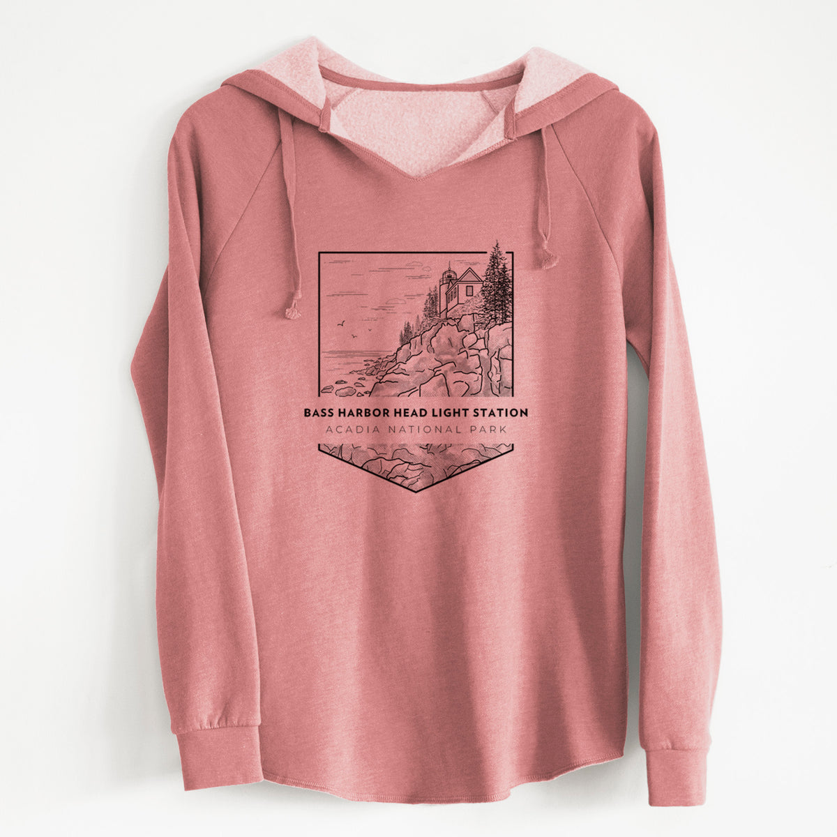 Dusty rose women's Cali Wave hooded sweatshirt laid flat, printed with a black line art badge of Bass Harbor Head Light Station on a rocky cliff, with the words Acadia National Park.