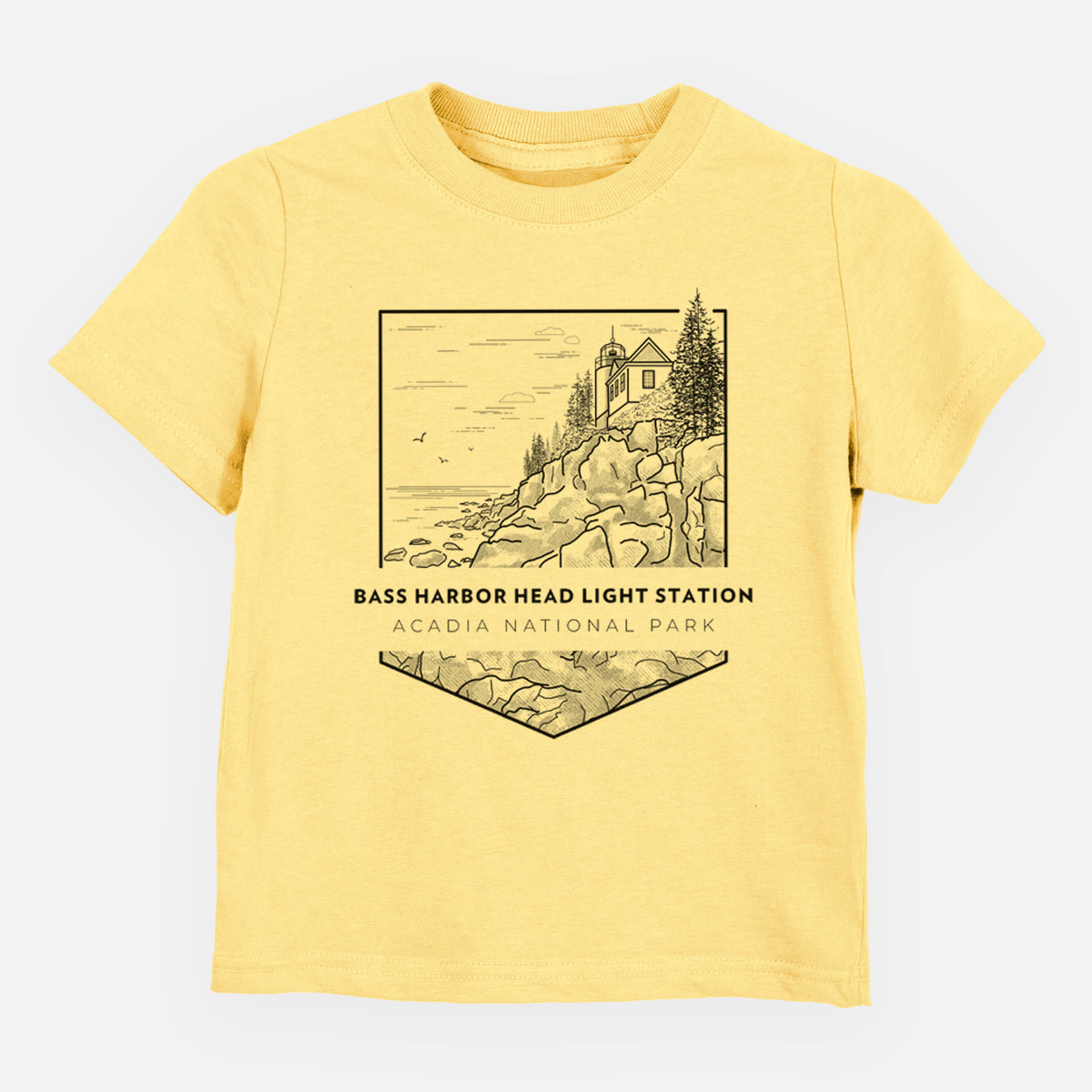 Butter yellow toddler t-shirt laid flat, printed with a black line art badge of Bass Harbor Head Light Station on a rocky cliff, with the words Acadia National Park.