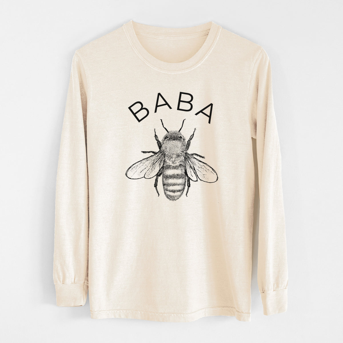 Ivory Comfort Colors long sleeve shirt laid flat, printed with a black ink honey bee beneath the word Baba.