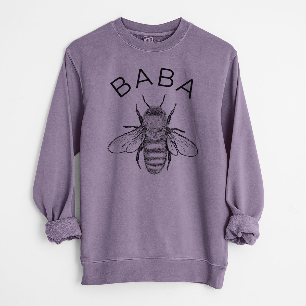 Plum purple pigment dyed crewneck sweatshirt laid flat with the sleeves rolled, printed with a black ink honey bee beneath the word Baba.