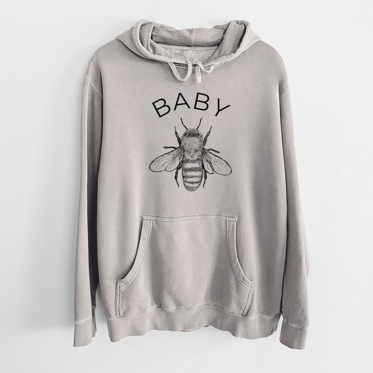 Cement grey pigment dyed hoodie laid flat, printed with a black ink honey bee beneath the word Baby.