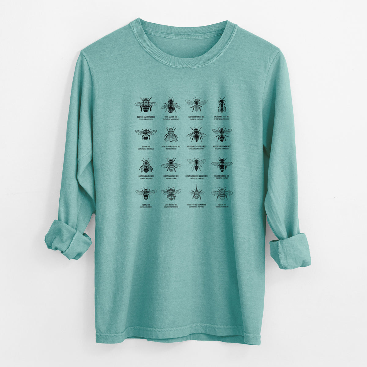 Reef green Comfort Colors long sleeve shirt laid flat with the cuffs rolled, printed with a chart of black ink illustrations of different bee species with their names.