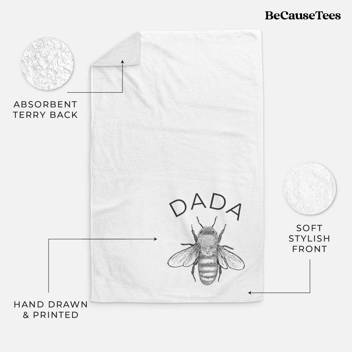 White hand towel printed with a black ink honey bee beneath the word Dada.