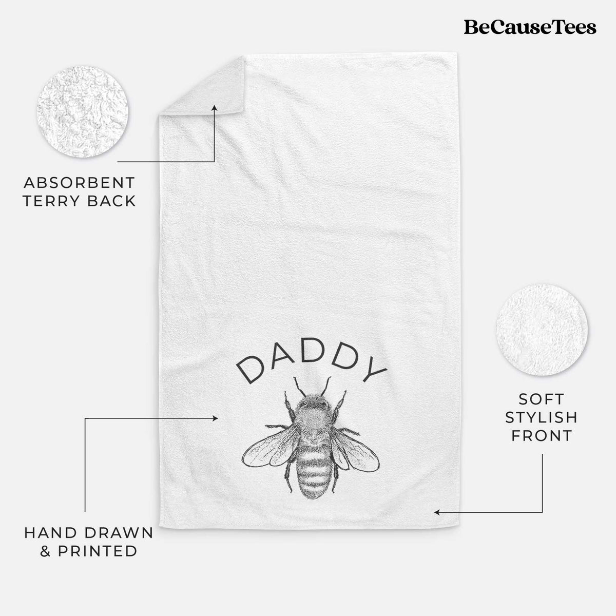 White hand towel printed with a black ink honey bee beneath the word Daddy.