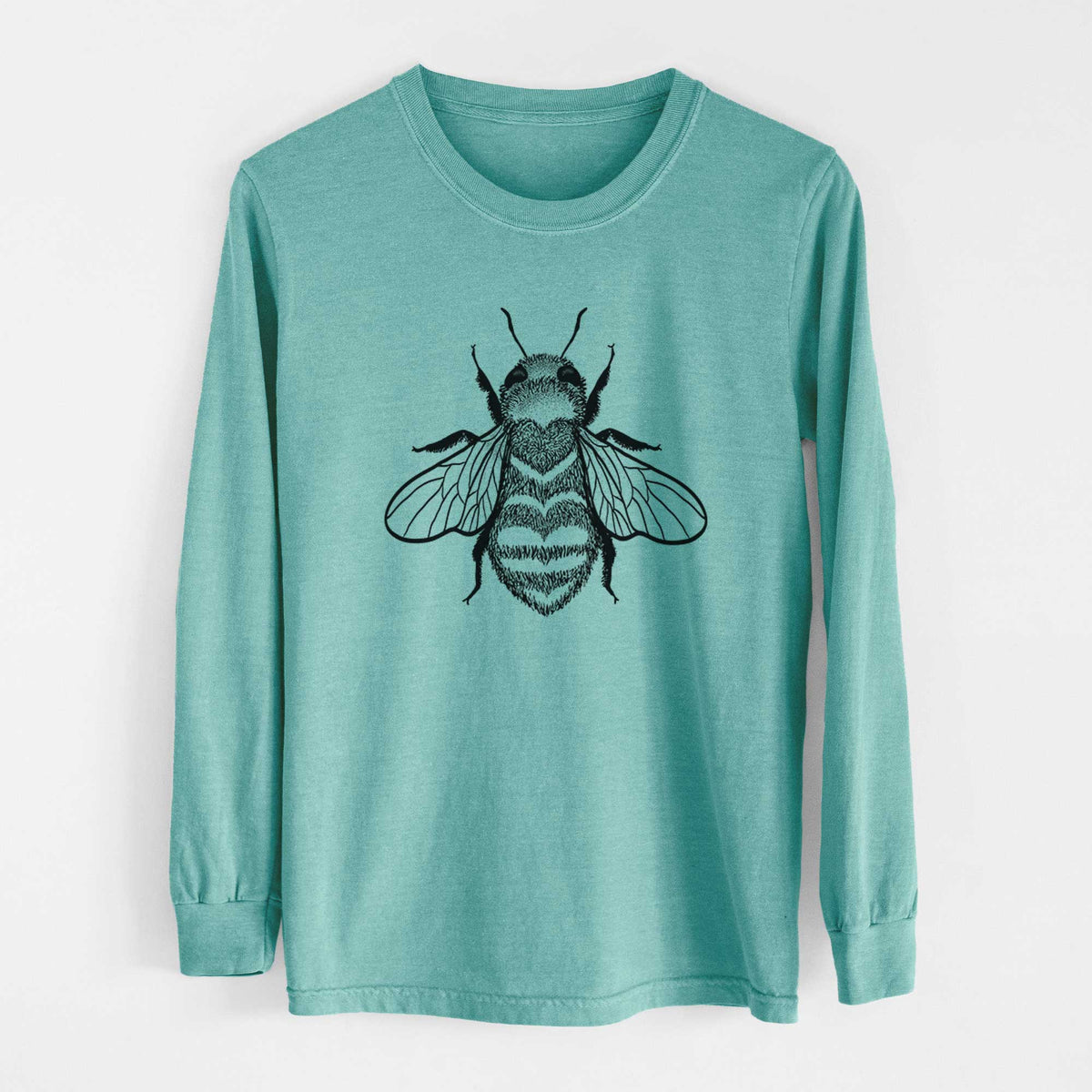 Reef green Comfort Colors long sleeve shirt laid flat, printed with a black ink bee with a heart pattern on its body.