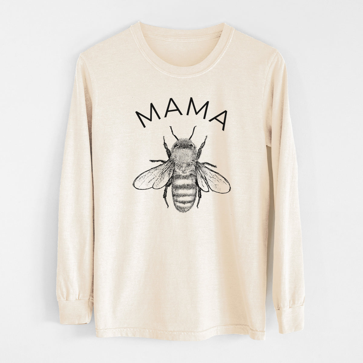 Ivory Comfort Colors long sleeve shirt laid flat, printed with a black ink honey bee beneath the word Mama.