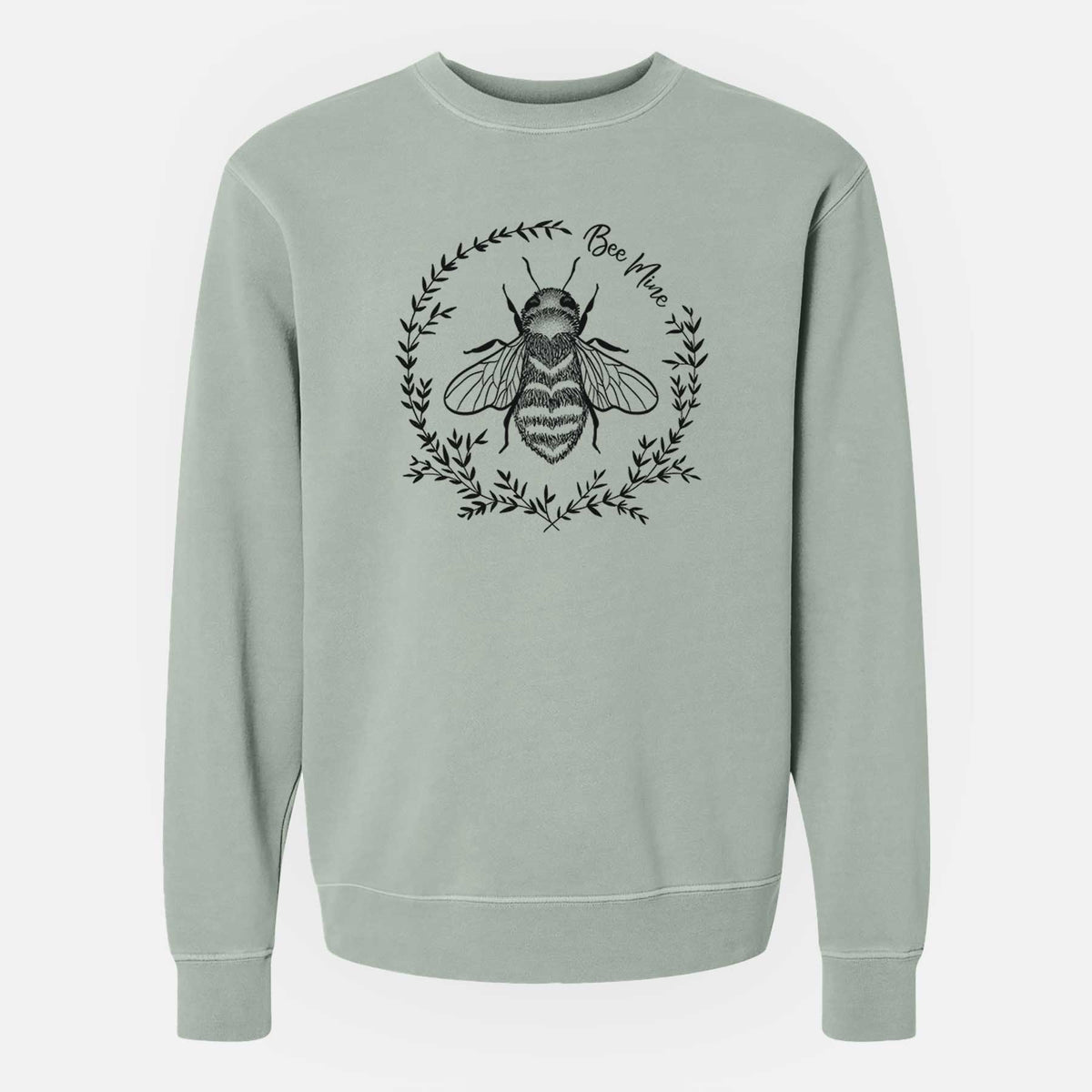 Sage green pigment dyed crewneck sweatshirt laid flat, printed with a black ink bee inside a wreath of leaves with the words Bee Mine.