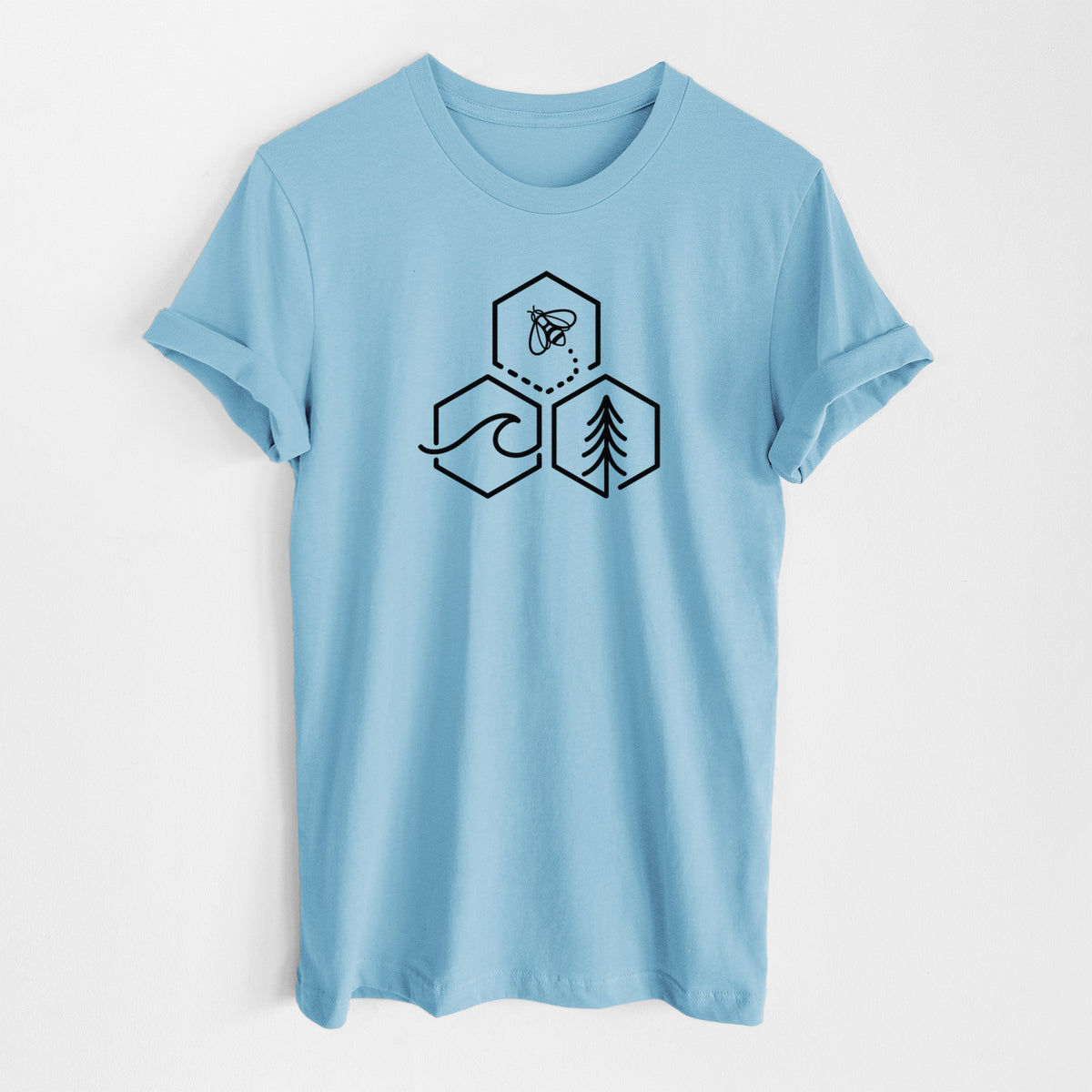 Ocean blue lightweight cotton t-shirt laid flat, printed with a black line art design of three hexagons holding a bee, an ocean wave and a pine tree.