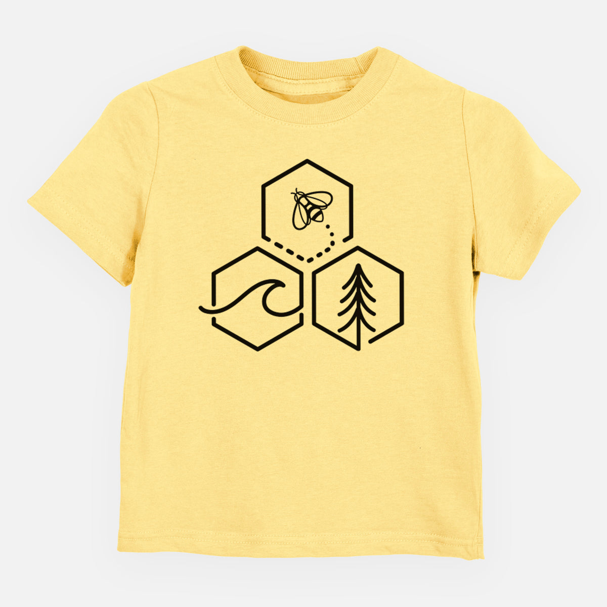 Butter yellow toddler t-shirt laid flat, printed with a black line art design of three hexagons holding a bee, an ocean wave and a pine tree.