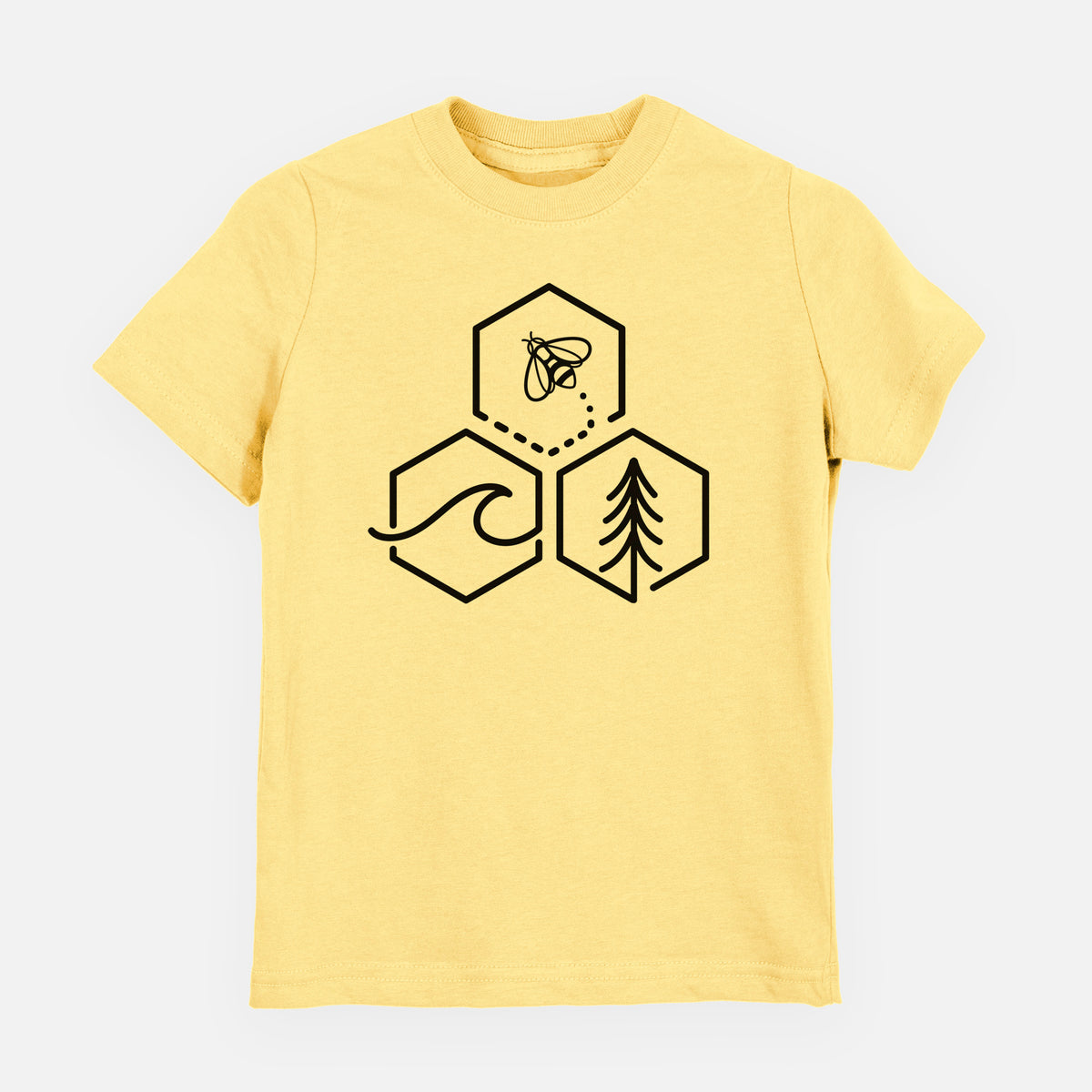 Butter yellow youth t-shirt laid flat, printed with a black line art design of three hexagons holding a bee, an ocean wave and a pine tree.
