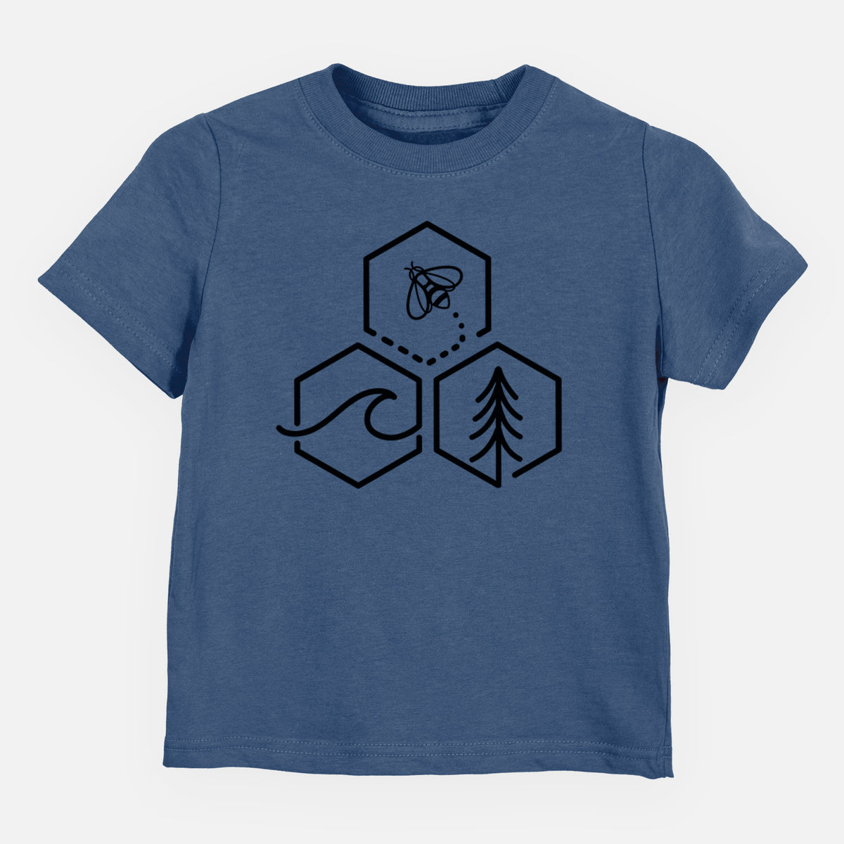 Indigo blue toddler t-shirt laid flat, printed with a black line art design of three hexagons holding a bee, an ocean wave and a pine tree.