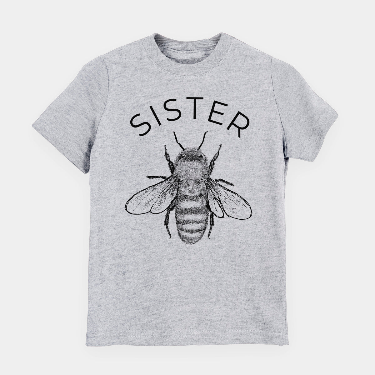 Heather grey youth t-shirt laid flat, printed with a black ink honey bee beneath the word Sister.