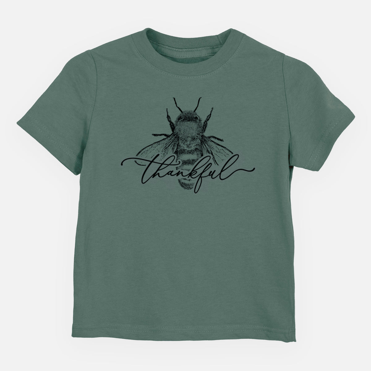 Basil green toddler t-shirt laid flat, printed with a black ink bee with the word thankful written in script across it.