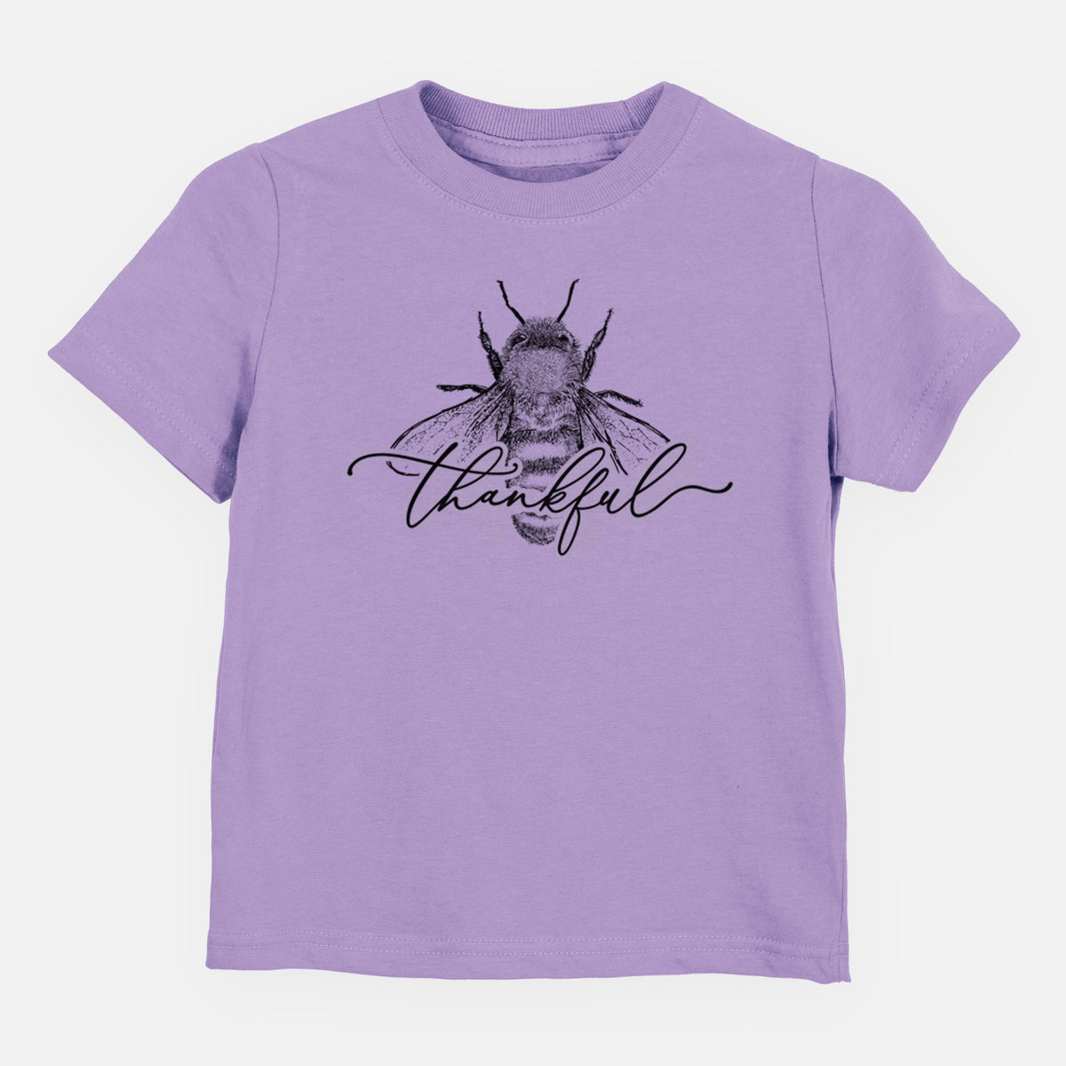 Lavender toddler t-shirt laid flat, printed with a black ink bee with the word thankful written in script across it.