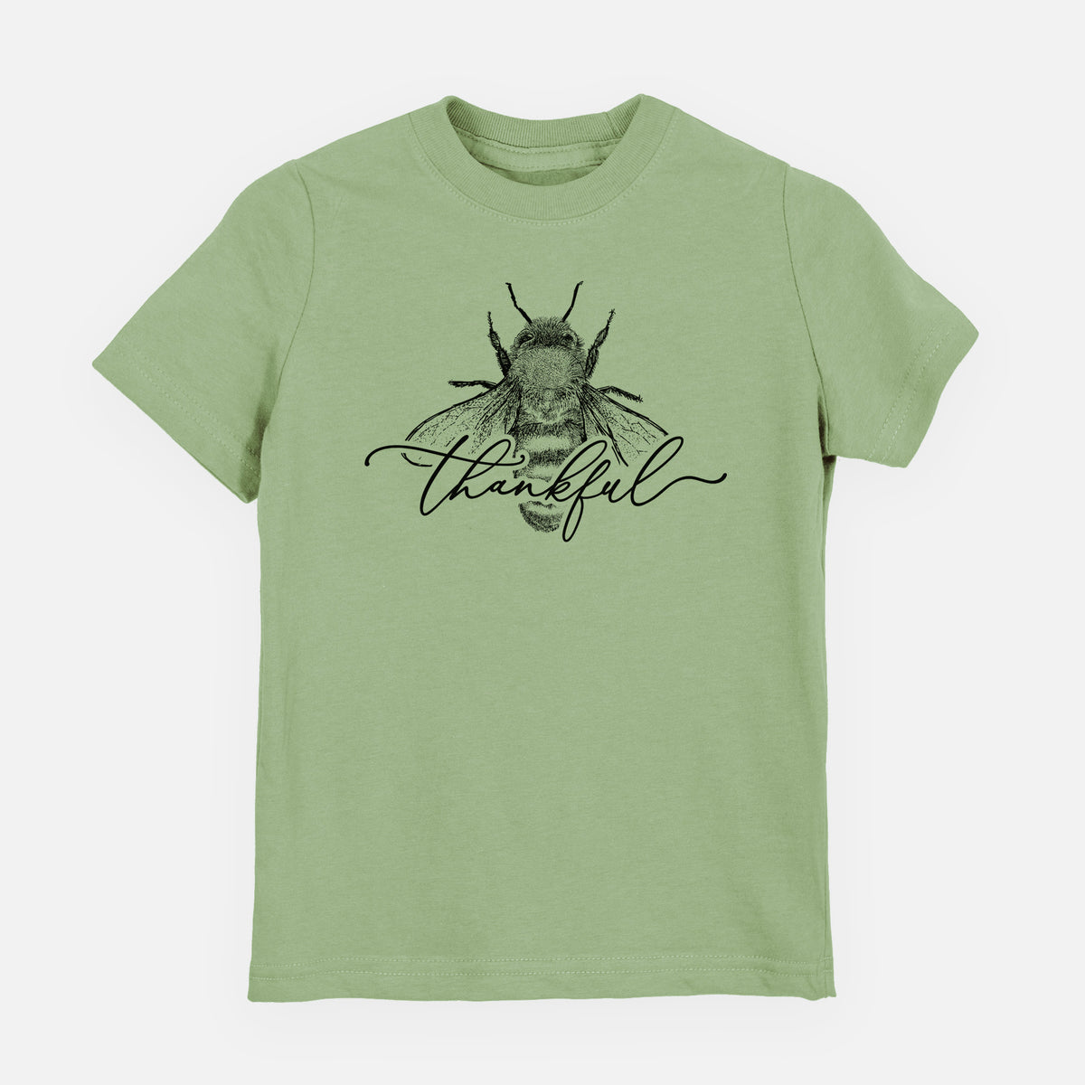 Sage green youth t-shirt laid flat, printed with a black ink bee with the word thankful written in script across it.