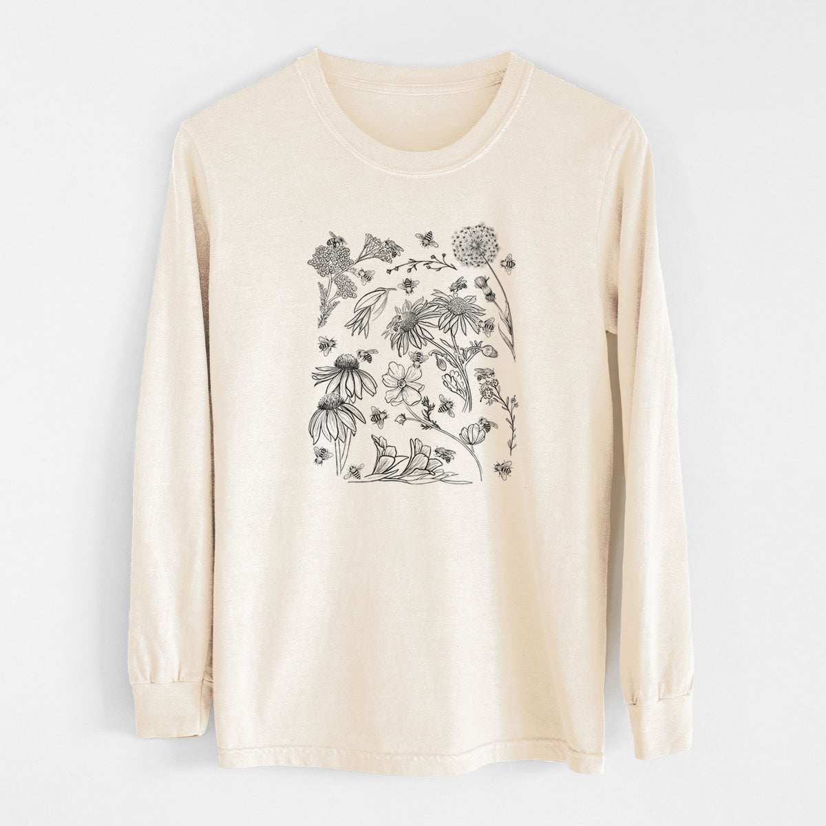 Ivory Comfort Colors long sleeve shirt laid flat, printed with black ink bees scattered among wildflowers.
