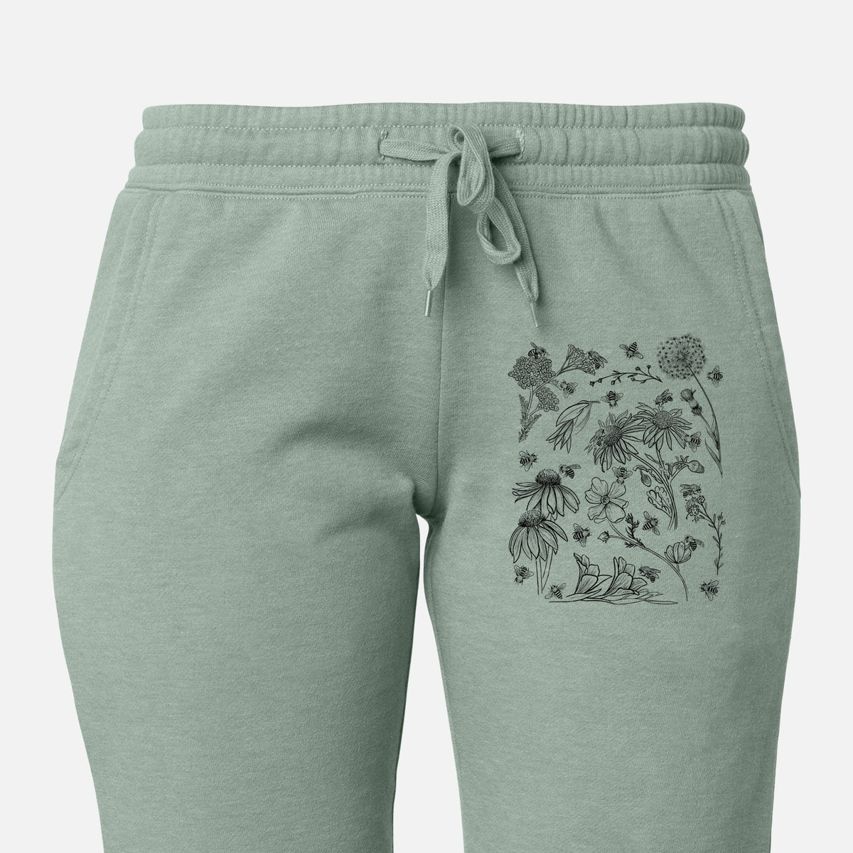 Front of sage green Cali Wave sweatpants, printed with black ink bees scattered among wildflowers on the leg.