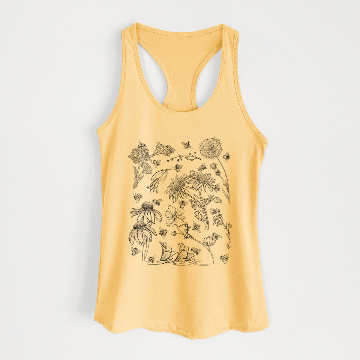 Banana cream women's racerback tank top laid flat, printed with black ink bees scattered among wildflowers.