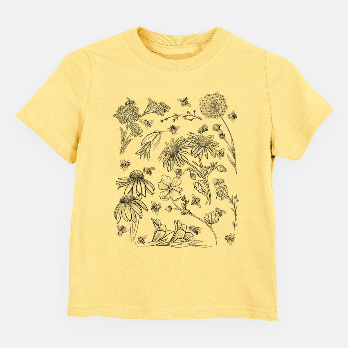 Butter yellow toddler t-shirt laid flat, printed with black ink bees scattered among wildflowers.
