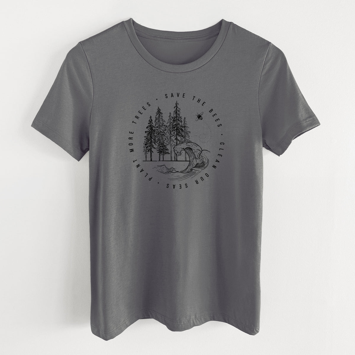 Asphalt women's relaxed fit cotton t-shirt laid flat, printed with a circle of pine trees and an ocean wave ringed by the words Save the Bees, Clean Our Seas, Plant More Trees.