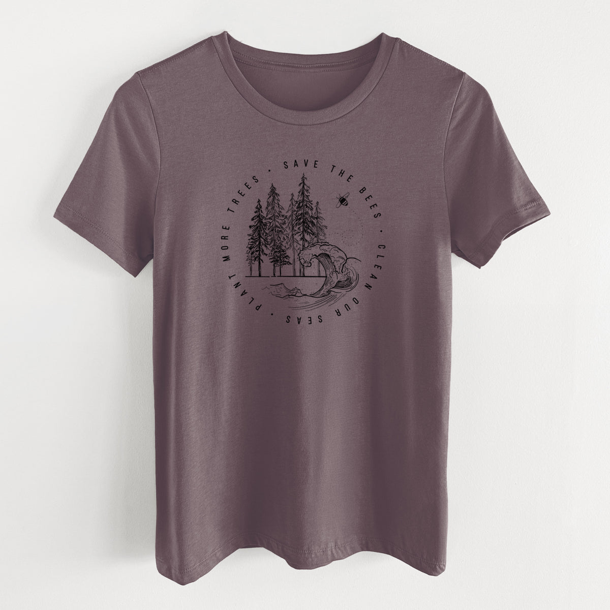 Purple storm women's relaxed fit cotton t-shirt laid flat, printed with a circle of pine trees and an ocean wave ringed by the words Save the Bees, Clean Our Seas, Plant More Trees.