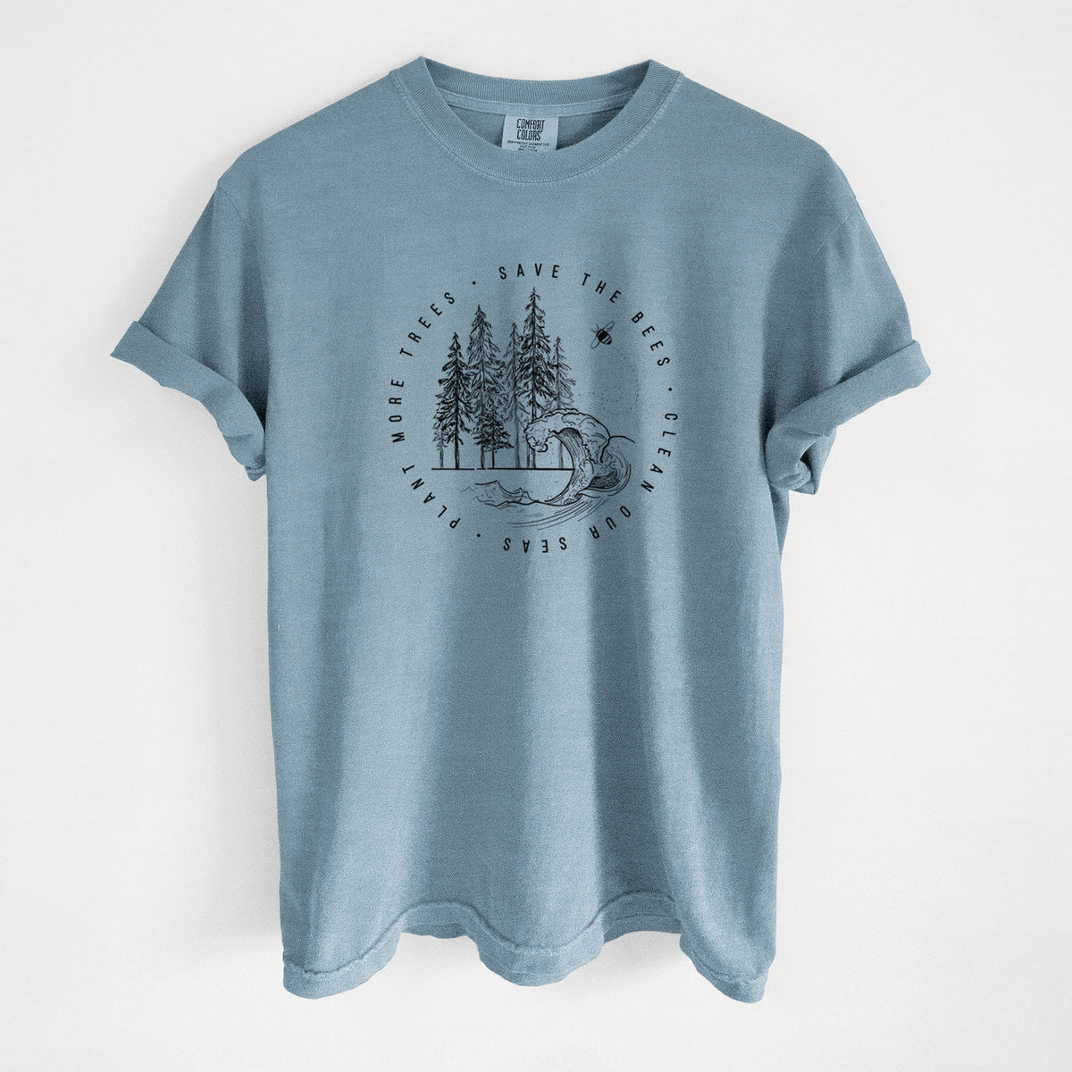 Steel blue Comfort Colors t-shirt laid flat, printed with a circle of pine trees and an ocean wave ringed by the words Save the Bees, Clean Our Seas, Plant More Trees.