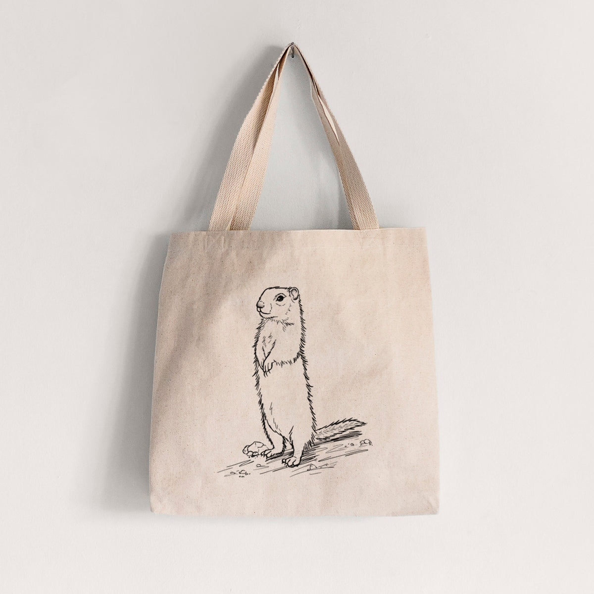 Natural canvas tote bag printed with a detailed black ink illustration of a Belding's ground squirrel standing upright.