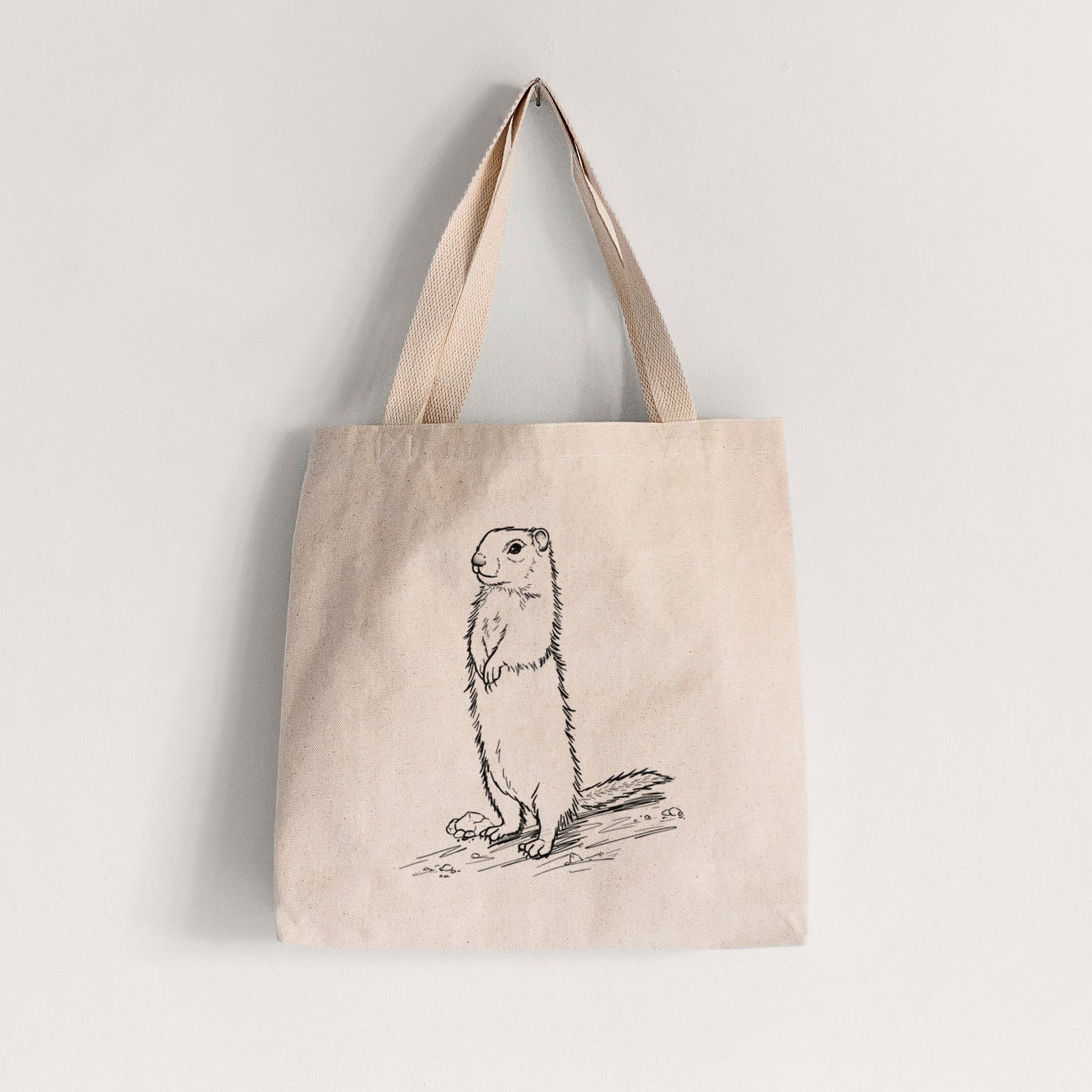 Natural canvas tote bag printed with a detailed black ink illustration of a Belding's ground squirrel standing upright.