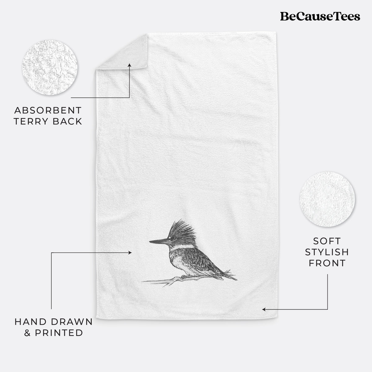 White hand towel printed with a detailed black ink sketch of a belted kingfisher perched on a branch.