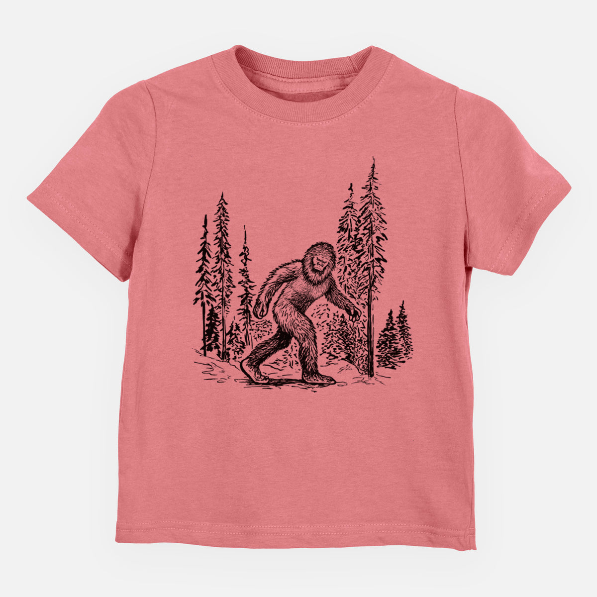 Mauve pink toddler t-shirt laid flat, printed with a black ink illustration of Bigfoot walking through a pine forest.