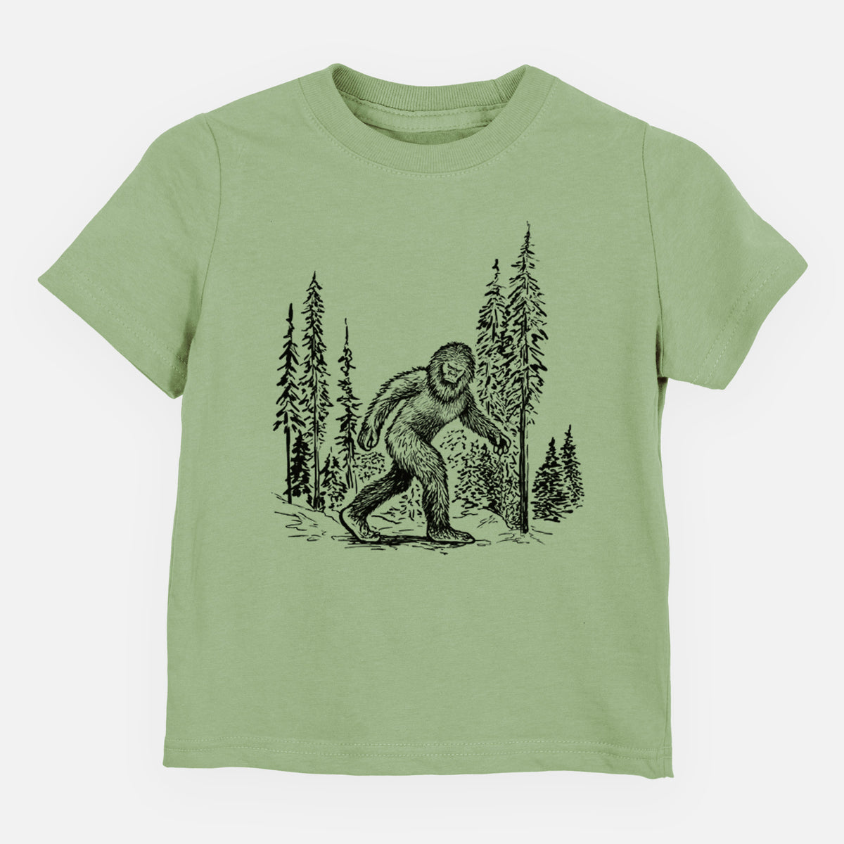 Sage green toddler t-shirt laid flat, printed with a black ink illustration of Bigfoot walking through a pine forest.