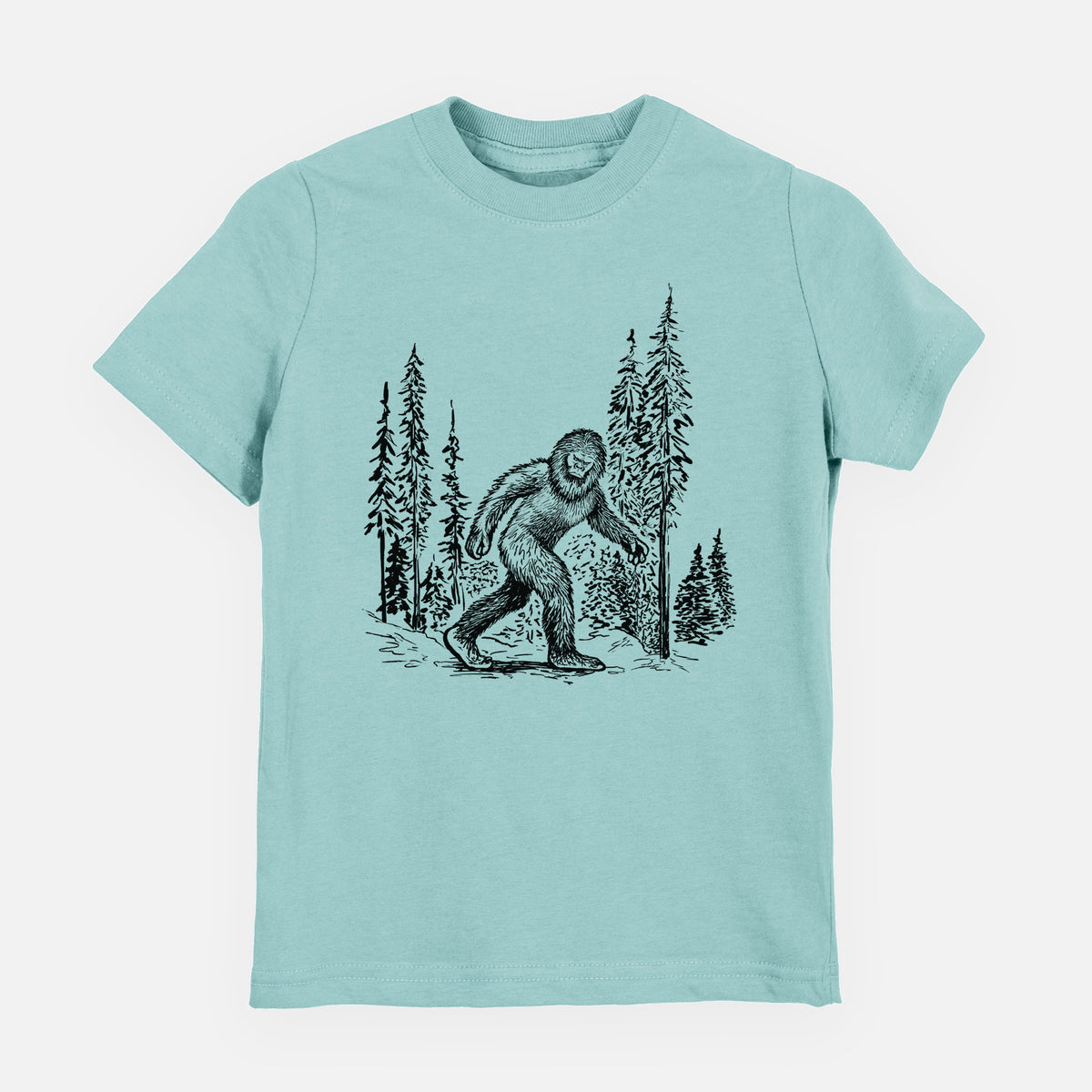 Saltwater youth t-shirt laid flat, printed with a black ink illustration of Bigfoot walking through a pine forest.