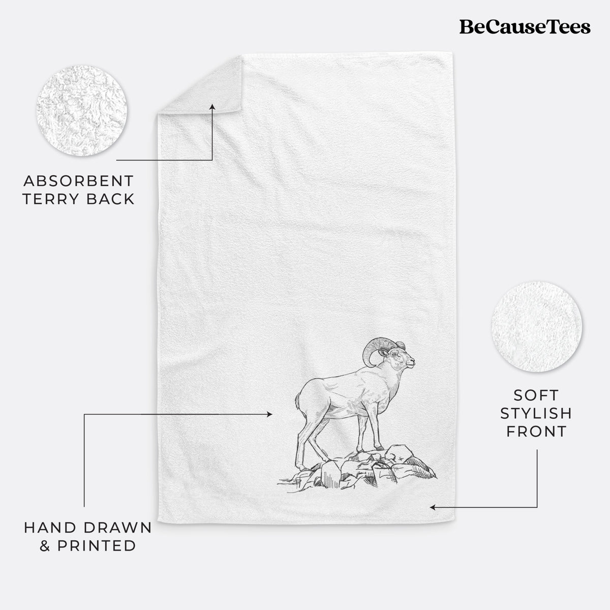 White hand towel printed with a black ink illustration of a bighorn ram with curled horns standing on rocks.